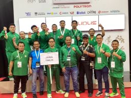 Bangkit dari Pensiun, Hasan Sidik Raih Emas dan Tiket Umroh di PON Bela Diri 2025