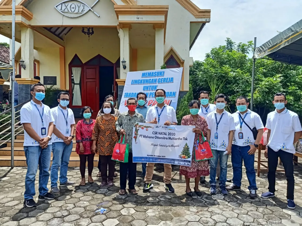 WOM Finence Berbagi Kasih Natal Ditengah Pandemi